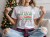 koszulka świąteczna damska, t-shirt świąteczny, koszulka z napisem, prezent na święta, koszulka z prosecco, świąteczny t-shirt dla kobiety, zabawna koszulka bożonarodzeniowa, modna koszulka na święta, koszulka z nadrukiem ho ho ho